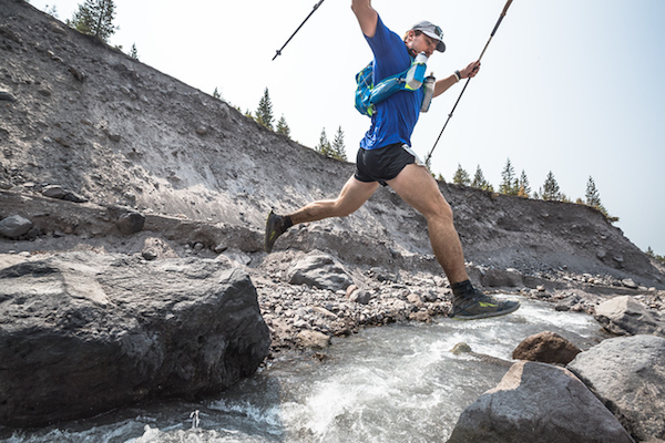 Image of leaping over stream